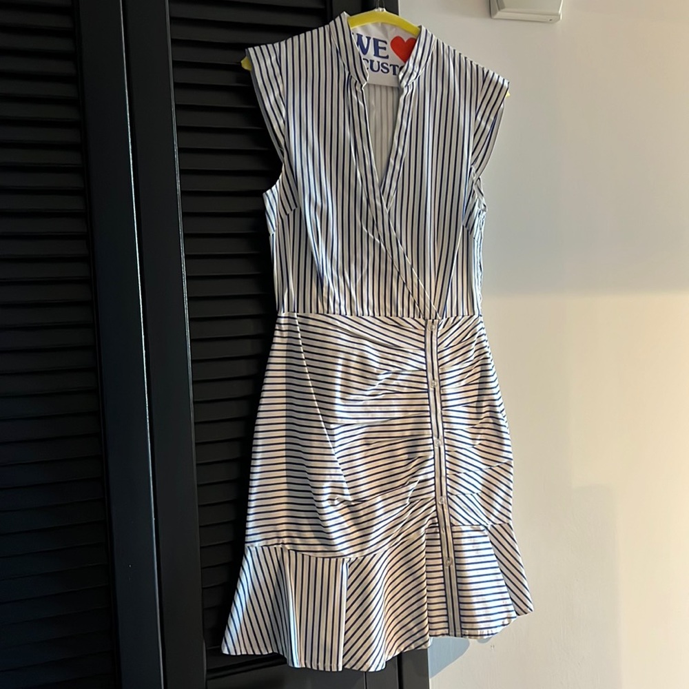 Blue and White striped dress with button detail. Great for work or for pleasure!